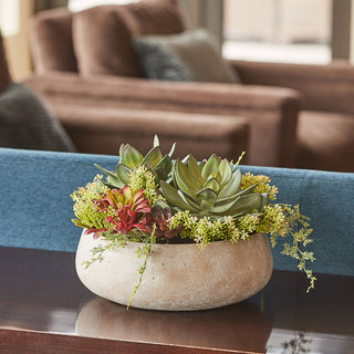 Chic round artificial succulent arrangement from CG Hunter, beautifully displayed in a sleek natural planter, adding a touch of luxury to any living space or decor.