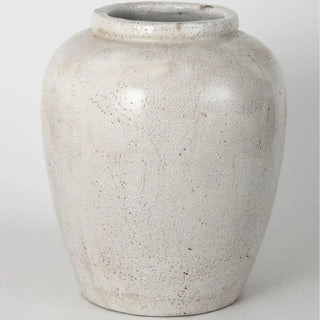 White textured vase on a light gray background