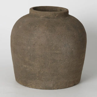 Brown ceramic vase on a white background