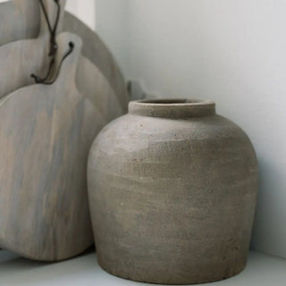 Rustic clay pot on a light background