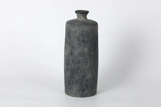 Dark gray ceramic vase on a white background