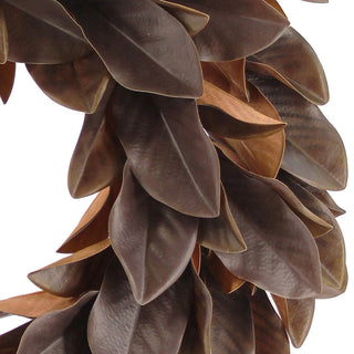 Close-up of the 30" Faux Brown Magnolia Leaf Wreath by CG Hunter, emphasizing the realistic texture and beautiful tones of the leaves.