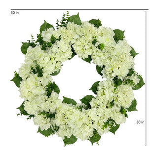 White floral wreath with green leaves on a white background, measuring 30 inches.