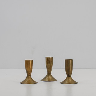Elegant 3.5" Iron Candleholders in Antique Brass by CG Hunter, showcasing a refined design perfect for enhancing home decor.