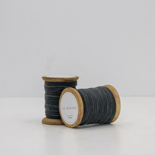 CG Hunter Narrow Hand Dyed Velvet Ribbon in Dark Grey, 10 Yards Per Spool, elegantly displayed on handcrafted wooden spools.