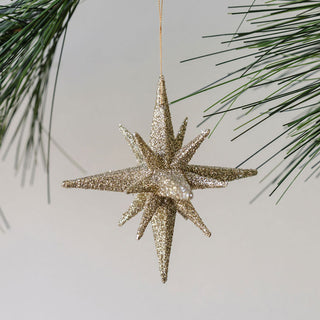 Dazzling 2.75" Gold Glitter Starburst Ornament by CG Hunter, featuring a sparkling starburst design, perfect for adding a luxurious touch to holiday decorations.