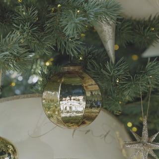 Close up video video of mercury glass ornaments 